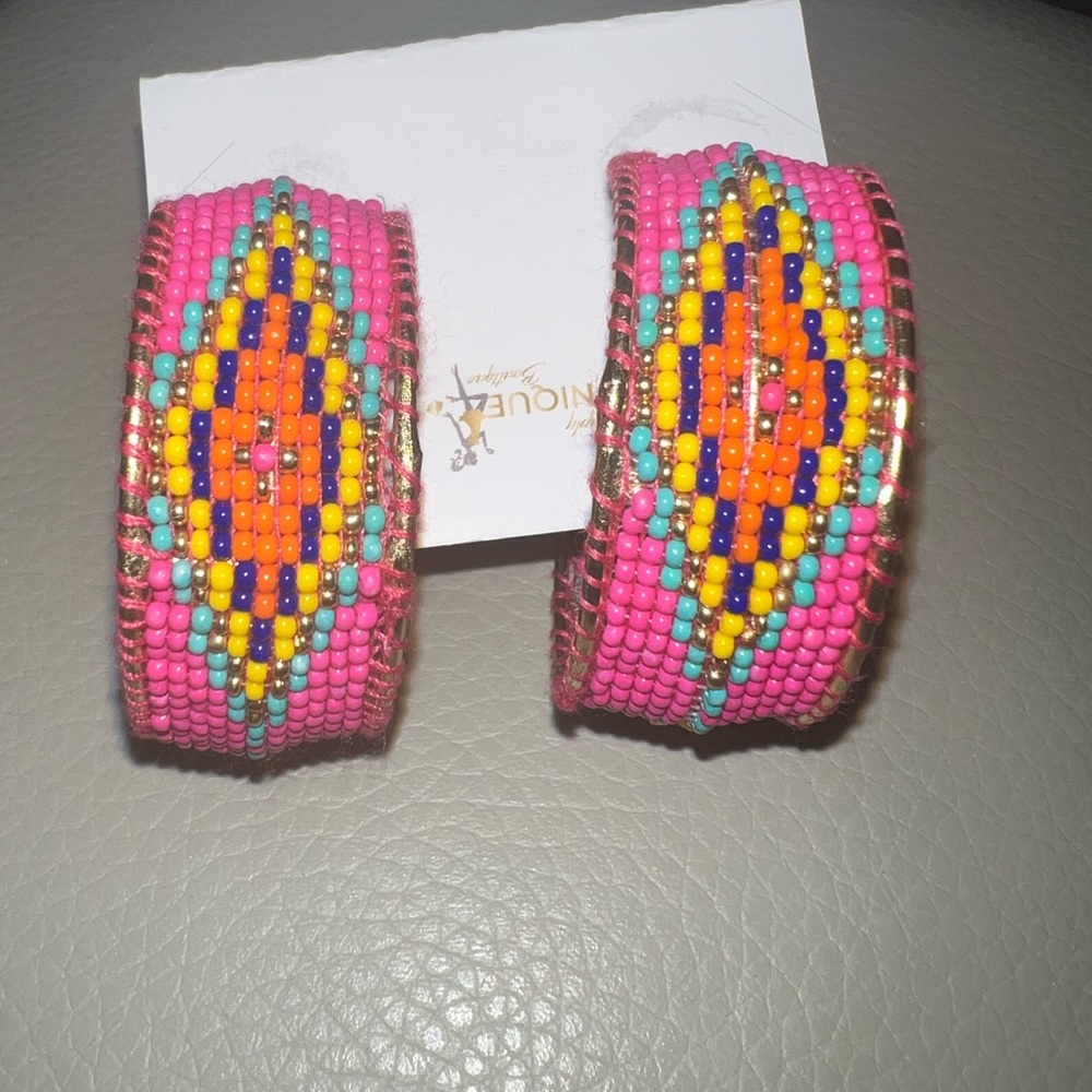 New beautiful pink beaded post hoop earrings .